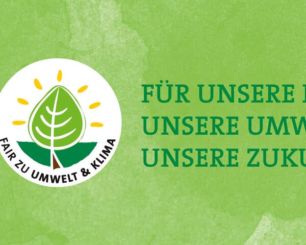 Schrift auf grünem Hintergrund: Für unsere Region, unsere Umwelt, unsere Zukunft 